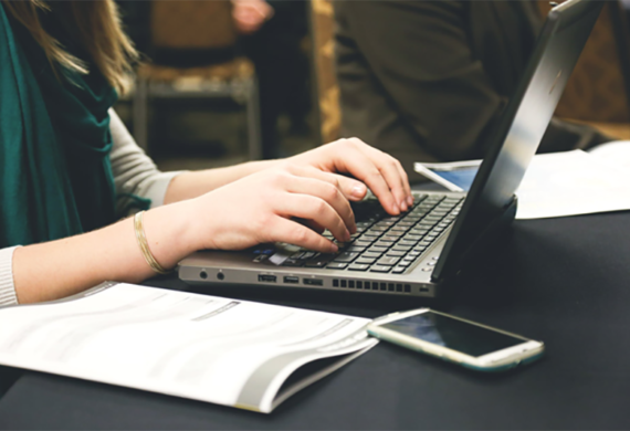 A woman working on her laptop