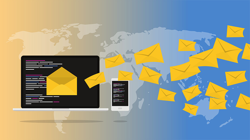 yellow mail envelopes flying from laptop screen