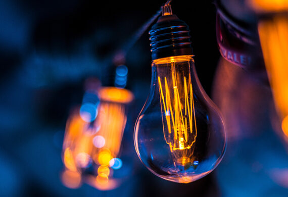 light bulb in a dim blue background