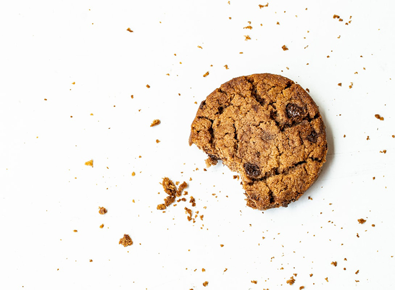 cookie with a bite on a white background