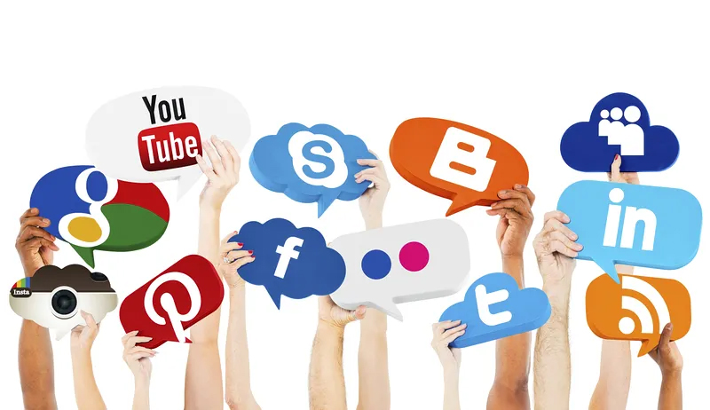 Hands Holding Speech Bubbles With Social Media Logos