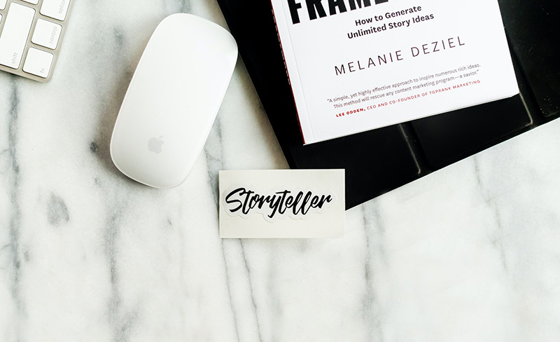 A flatlay of a workspace, with a white marble background.