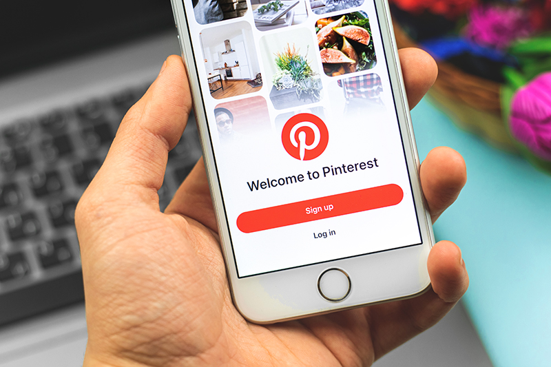 Pinterest application logo on smartphone screen