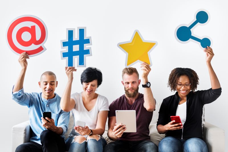 People holding an social media icon