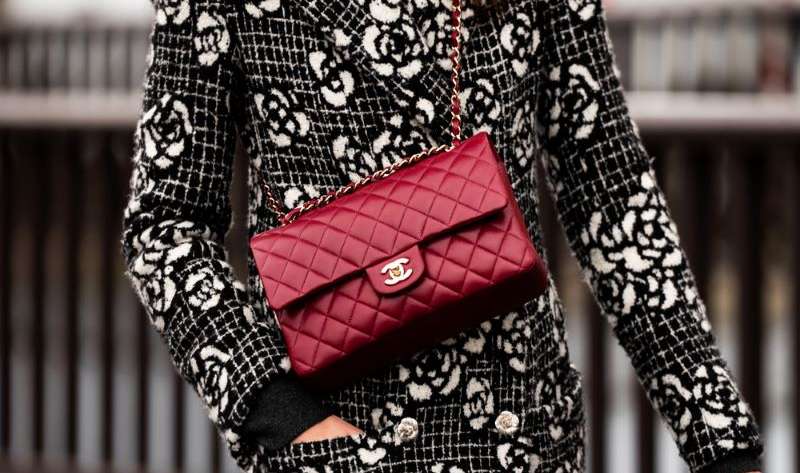 Woman wears chanel bag